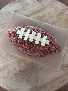 Football Cheese Ball with cheese laces